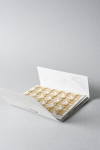 popieriniai nuotrauku kampučiai